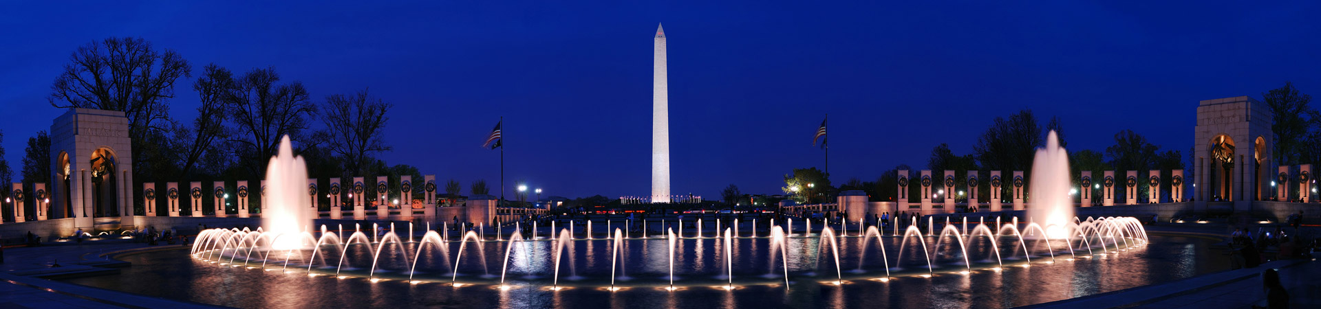  WWII National Monument fountain overlooking the Washington Monument at night 